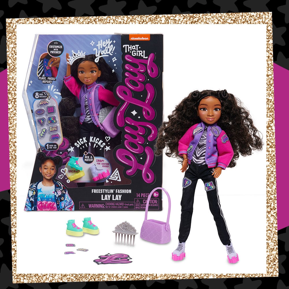 Product photo fo the That Girl Lay Lay Freestylin' Fashion Doll. The doll is posed next to the box, and the accessories including a purse, comb, and extra shoes are laid out next to it.