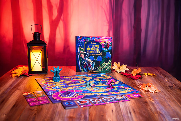 Product photo of the Disney Return of the Headless Horseman game showcasing the box, board, pieces, and other game elements